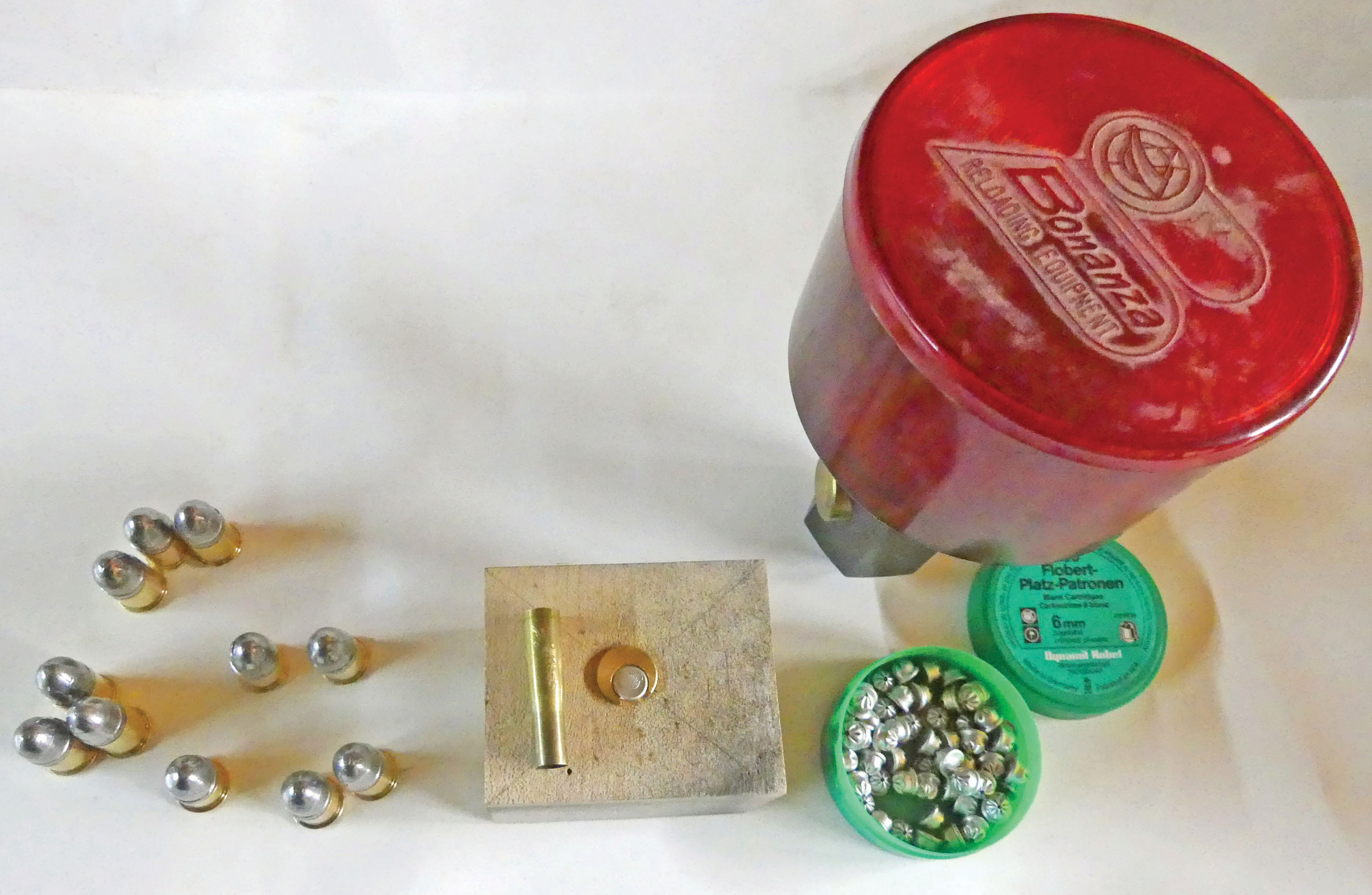 Loads, loading block, Flobert blanks and Bullseye powder measure.Loads, loading block, Flobert blanks and Bullseye powder measure.